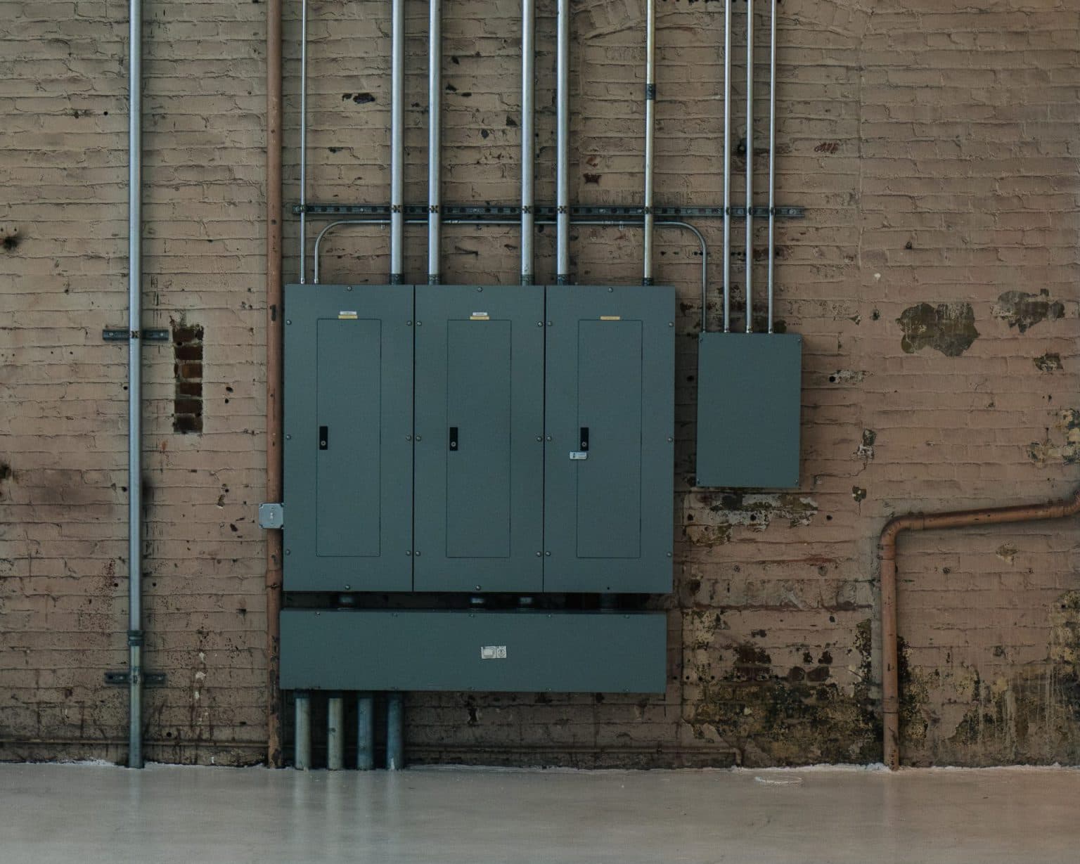 Industrial electrical panel enclosure in a plant room